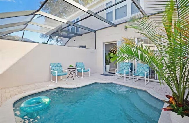 Building Photo - 8117 Princess Palm Ln