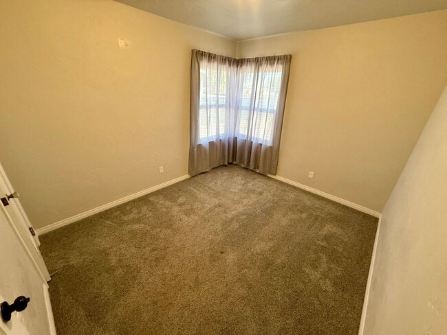 Building Photo - Charming 2-Bedroom Home with Patio, Storage & Plenty of Parking