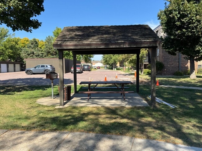 Building Photo - 2BR Condo Near Empire Mall with Garage, Pool & Easy Interstate Access!