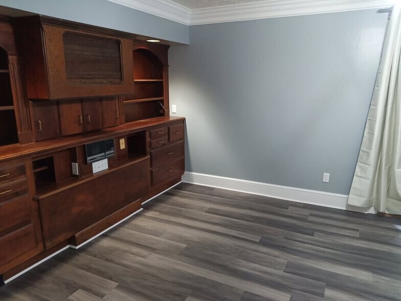 Bedroom with Bookshelves. - 109 Limberlost Dr