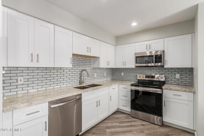 Building Photo - 9460 E Mission Ln