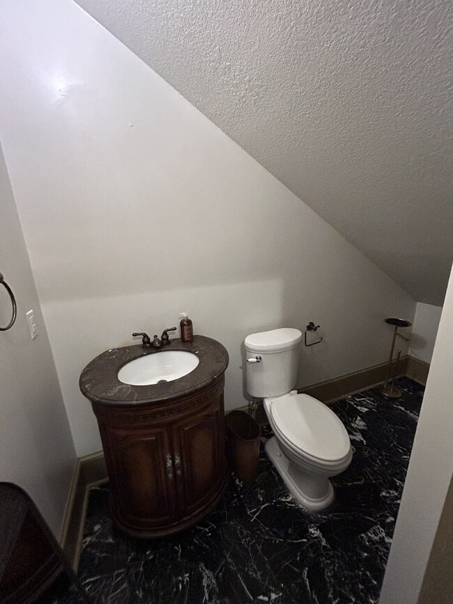 Building Photo - "Charming 4-Bedroom Retreat with Granite F...