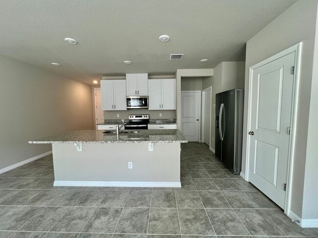 Building Photo - Gorgeous Brand New 3/2.5 Townhome