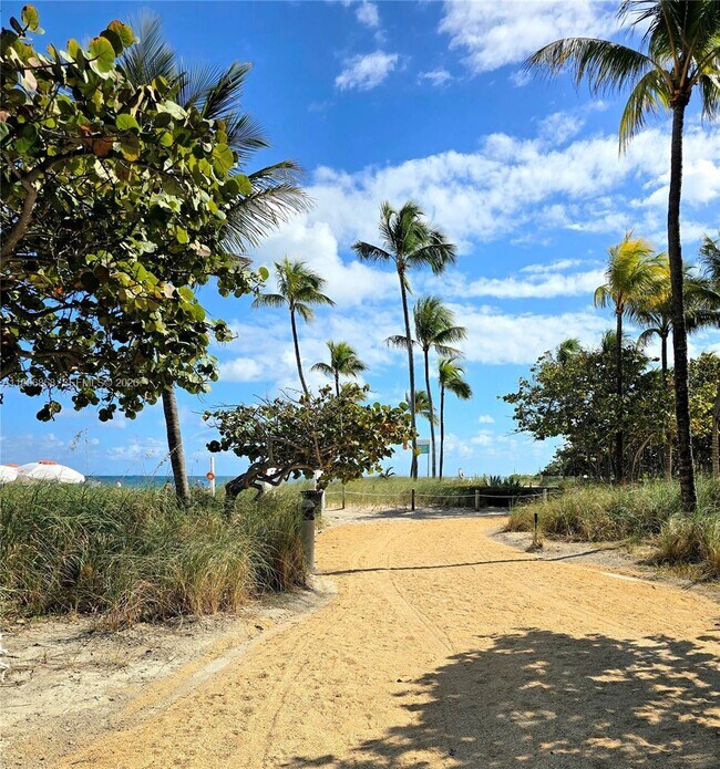 Building Photo - 10175 Collins Ave