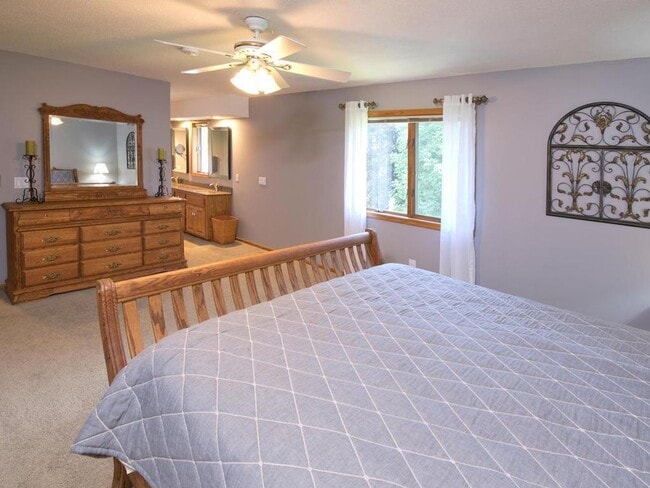 Building Photo - Elegant 2-Story has 4 BRs on Upper Level, Office, 2 Family Rooms, Fireplace & More!