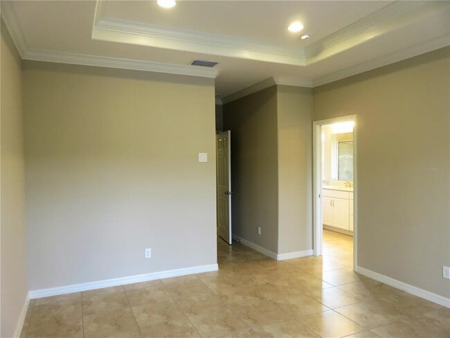 Building Photo - 8828 Tropical Palm Dr
