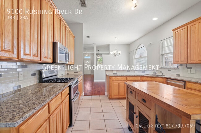 Building Photo - 9100 Rushing River Dr
