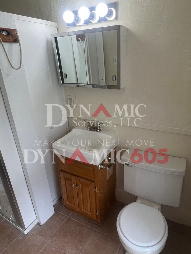 Building Photo - Studio with Bathroom - All Utilities Paid ...