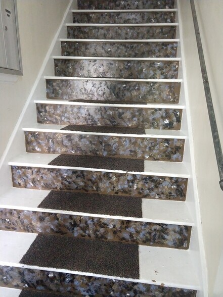 Interior steps to 2nd floor apartments - 408 S 6th St