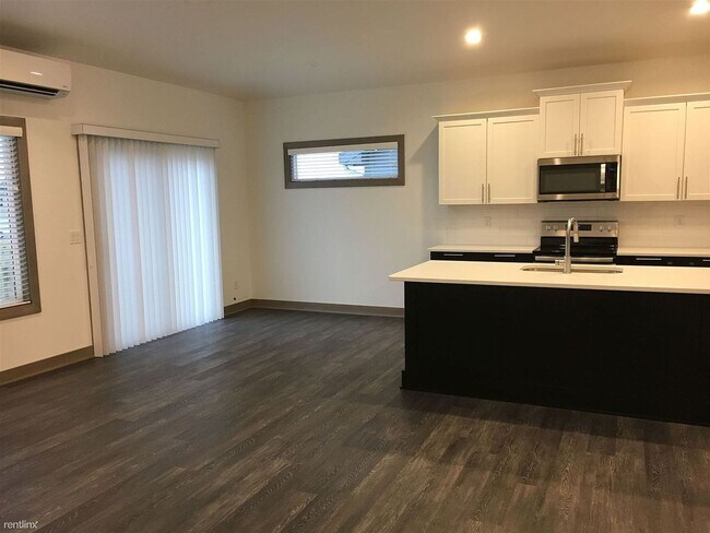 Building Photo - Spacious 4 bedroom/3 bath home with finished lower level and attached 2 car garage