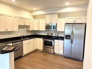 Building Photo - Updated end unit condo for rent available now - 3bd 2 bath