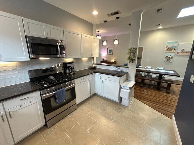 Building Photo - **APPLICATION RECEIVED** *COMING SOON* Updated Home Near Downtown – EV Charger, Office & Outdoor ...