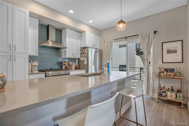 Building Photo - Spacious 3-Bed Townhouse with Finished Basement in Denver's Heart