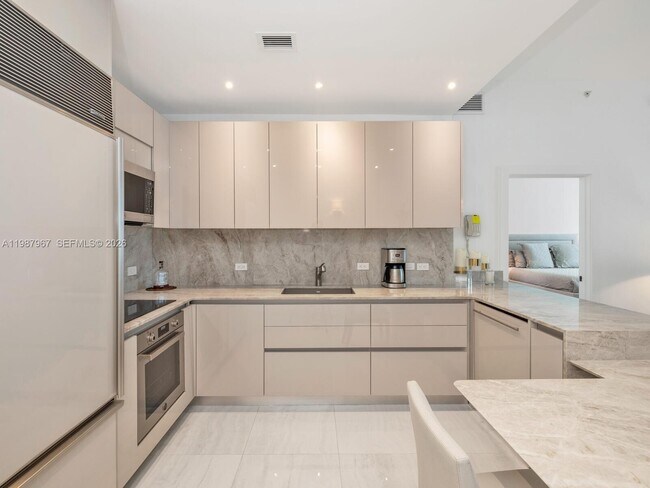 Building Photo - 6799 Collins Ave