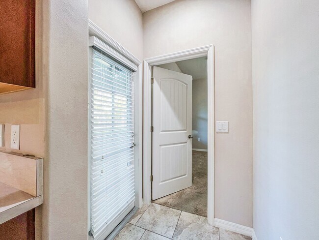 Building Photo - Spacious 4-Bedroom Townhome in Harmony – A Perfect Blend of Nature & Comfort!