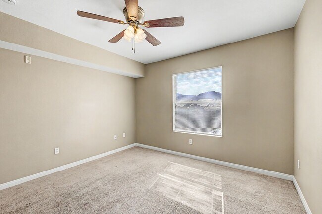 Building Photo - One bedroom condo with detached garage!