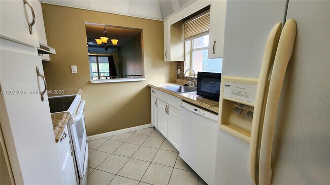 Building Photo - 2700 Coral Springs Dr