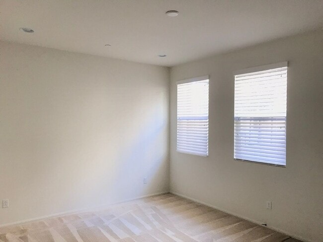 Building Photo - Beautiful 2 Bedroom Condominium with Attached Garage Located in Gated Community of Eastvale