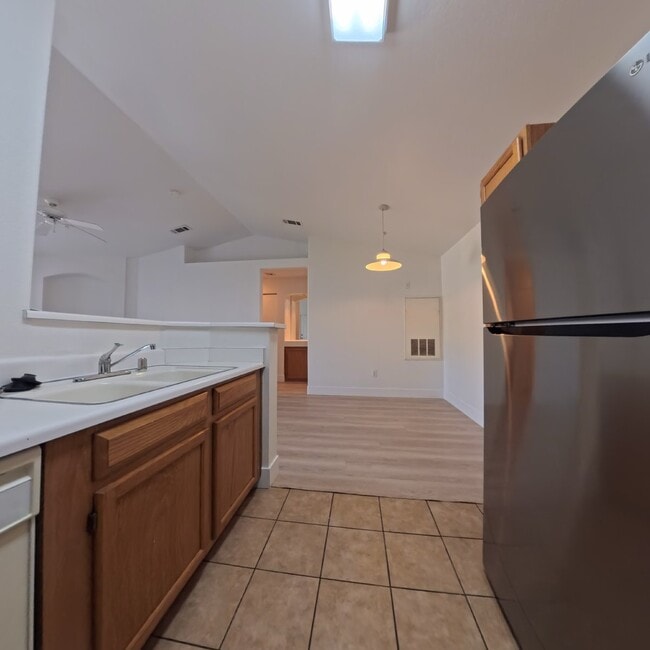 Building Photo - Upgraded 1 Bed 1 Bath Second-Story Condo at Opulence!