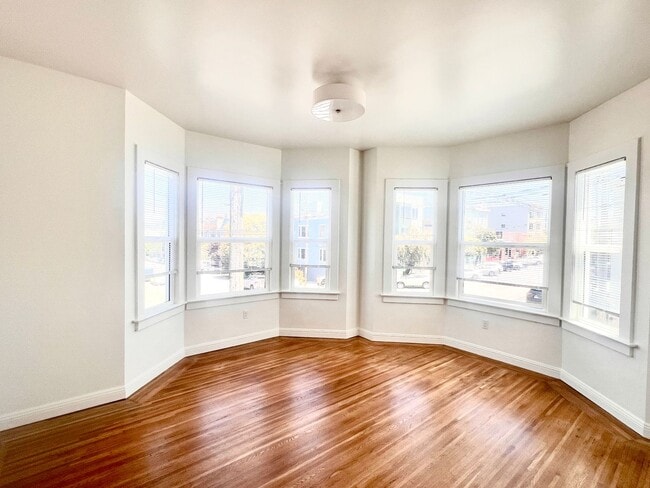 Building Photo - Fully Renovated Bright Corner Apartment wi...