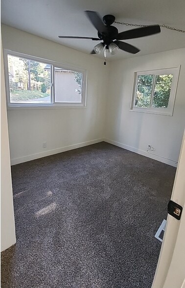 One bedroom on the main floor level to the street - 22266 Crest Ln