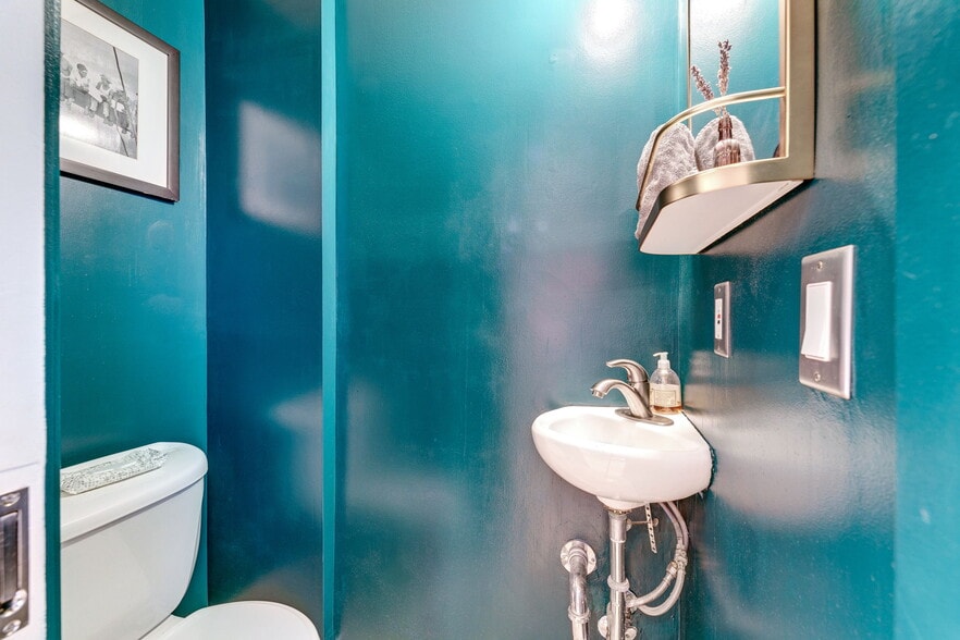 Main level Powder room with designer fixtures! - 602 14th Pl NE