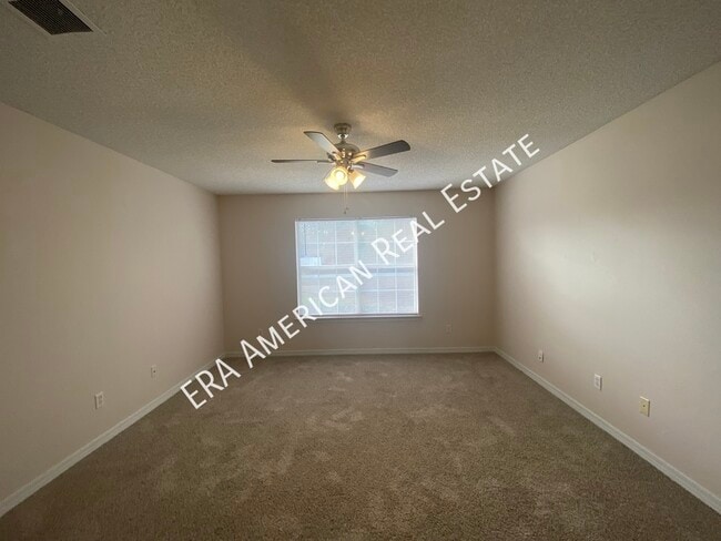 Building Photo - 7418 Woodmont Rd