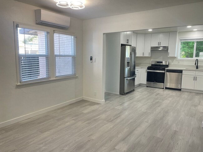 Building Photo - Location, Location, Location! Adorable Riverside Home Ready for Immediate Move In