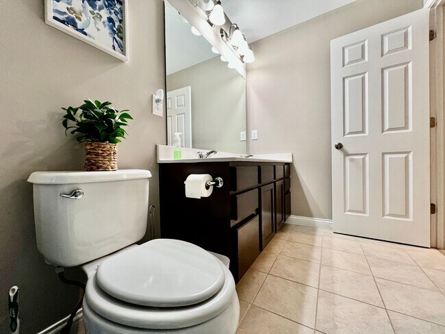 Building Photo - Executive corporate rental features community pool. Fully furnished and includes all utilities.