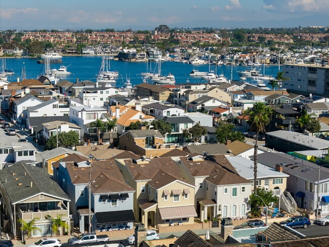 Building Photo - "Coastal Tommy Bahama at 208 East Balboa: Fully Furnished 3-Bed Sanctuary with Rooftop Deck