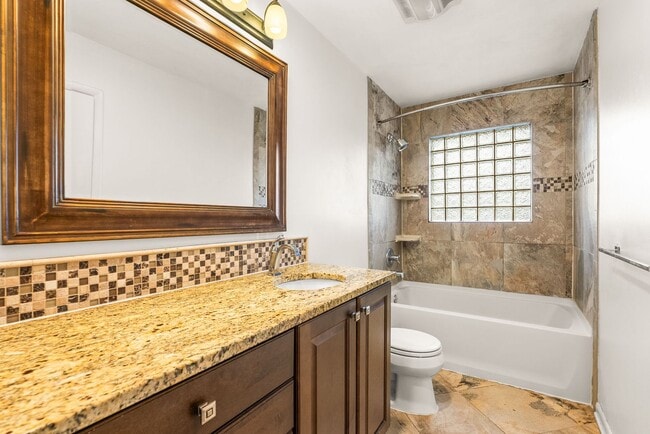 Building Photo - Updated 3BR/2BA Brick Home with Hardwood Floors & Large Yard