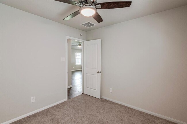 Building Photo - 4922 Blue Jacaranda Wy