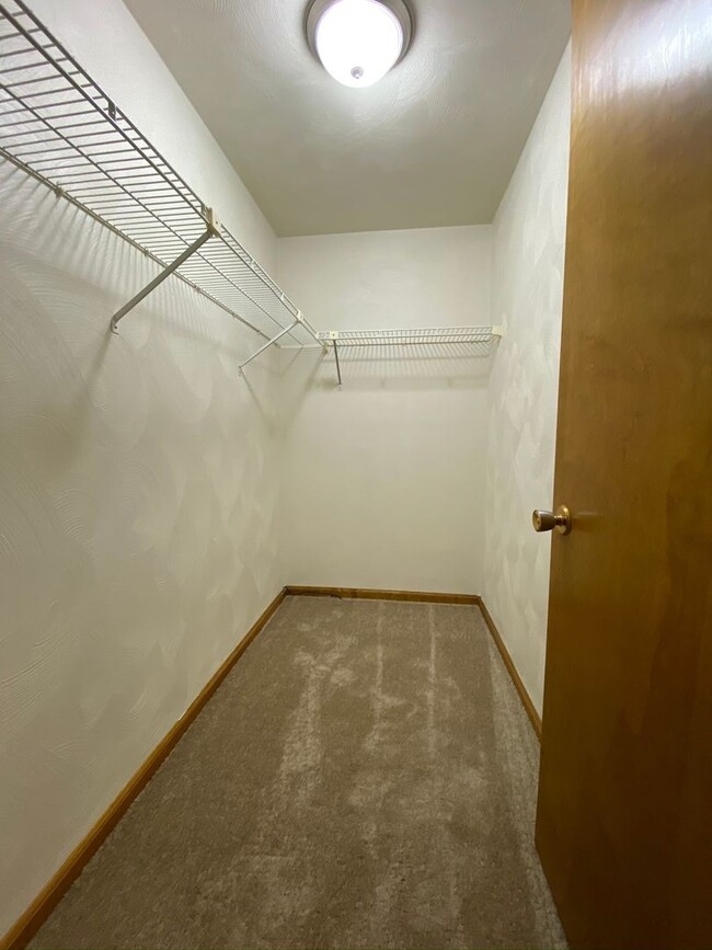 Building Photo - Lovely 2 Bedroom Townhouse with Private Patio, Off-Street Parking & MORE! Call Today!!