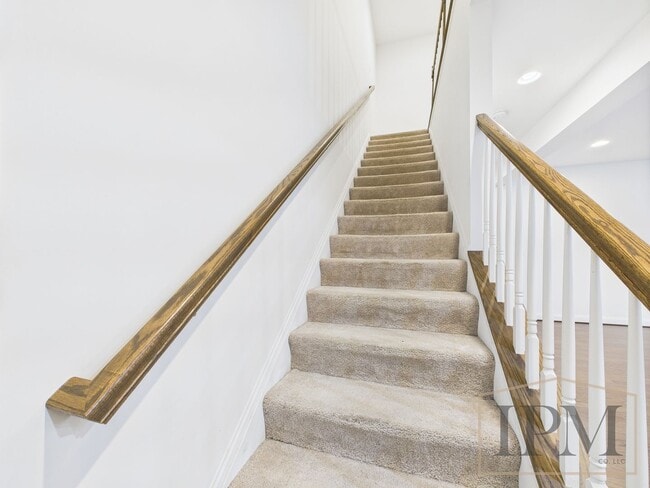 Building Photo - 2-bedroom 2.5 bath Luxury Townhome located...