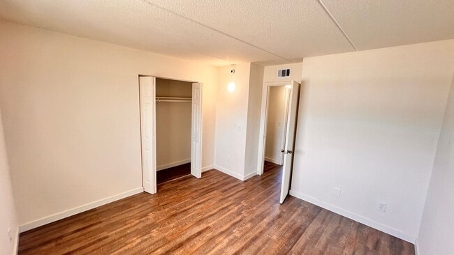 Building Photo - Fresh Paint, New Floors, 2/1 Available NOW