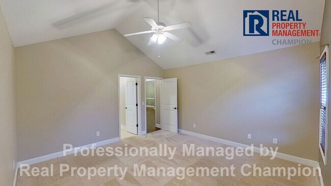 Building Photo - Beautiful home boasts open floorplan, screened porch, and spacious fenced yard