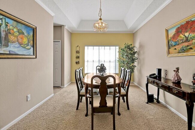 Building Photo - "Stunning 3BR Orlando Home with Private Screened Pool, Spa & Spacious Living Areas"