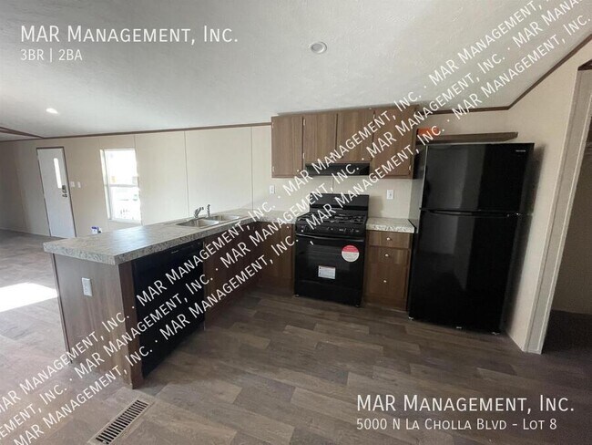 Building Photo - 5000 N La Cholla Blvd