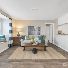 Deluxe Living Room with Bay Window - Forest at Chasewood