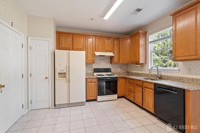 Building Photo - 1209 Blossom Cir