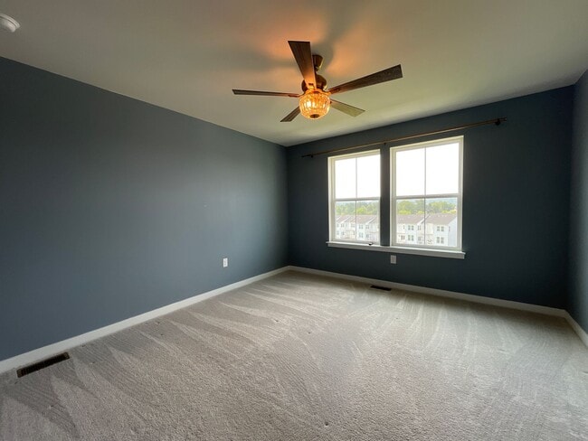 Building Photo - Move-in-ready Brookside Court townhome off...