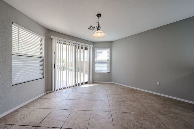 Building Photo - Introducing a stunning 4-bedroom, 2.5-bath...