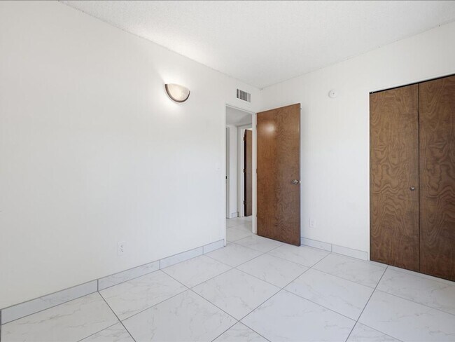 Building Photo - Concept Living with Large Enclosed Backyard & Modern Upgrades!