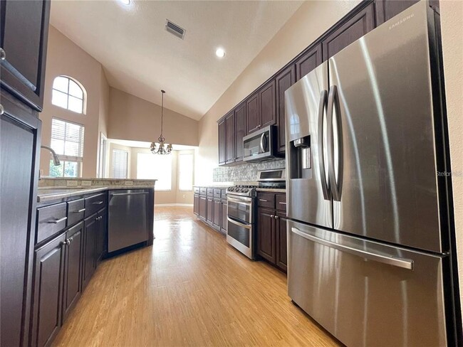 Building Photo - 10205 Quails Landing Ave