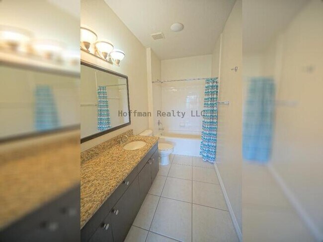 Building Photo - Beach Walk Condo | 2BR/2BA with Bay Views