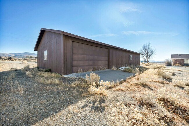 Building Photo - 20 Acre Ranch with House, Barn, Separate Workshop, and 5-Car Garage