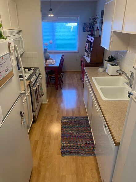 Building Photo - Convenient 2 Bedroom 2 Bathroom Condo Living "In The Trees" with On-Site Amenities