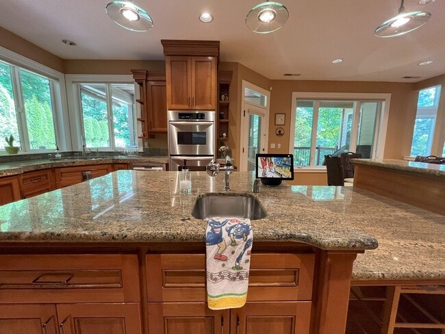 Building Photo - Forest-View Luxury Home with 5 Bedrooms, Luxury Primary Suite & Gourmet Kitchen