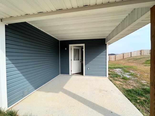Building Photo - Fenced home close to post!