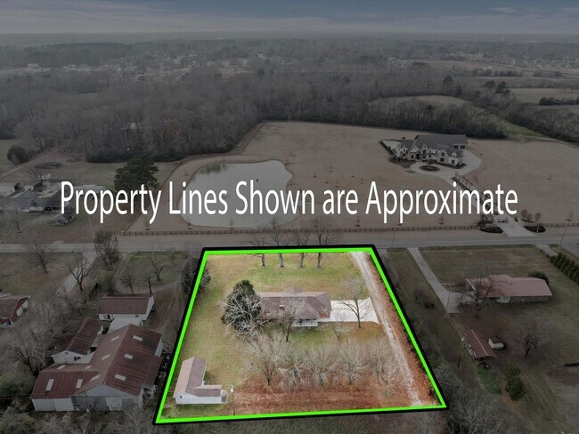 Building Photo - Charming 4-bedroom, 2-bath ranch-style home situated on just over 2 acres!